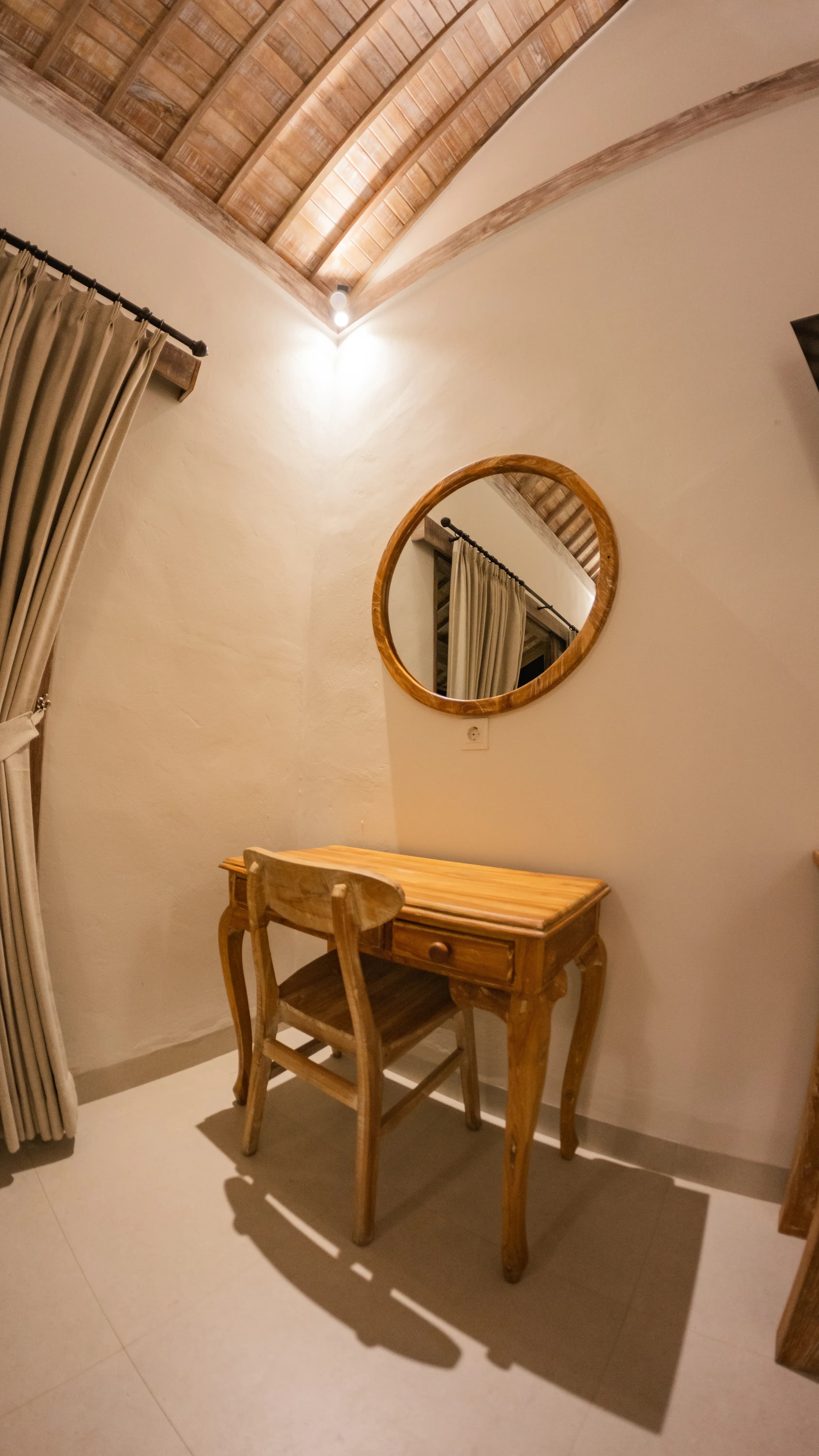 Warm-toned bedroom with balcony view