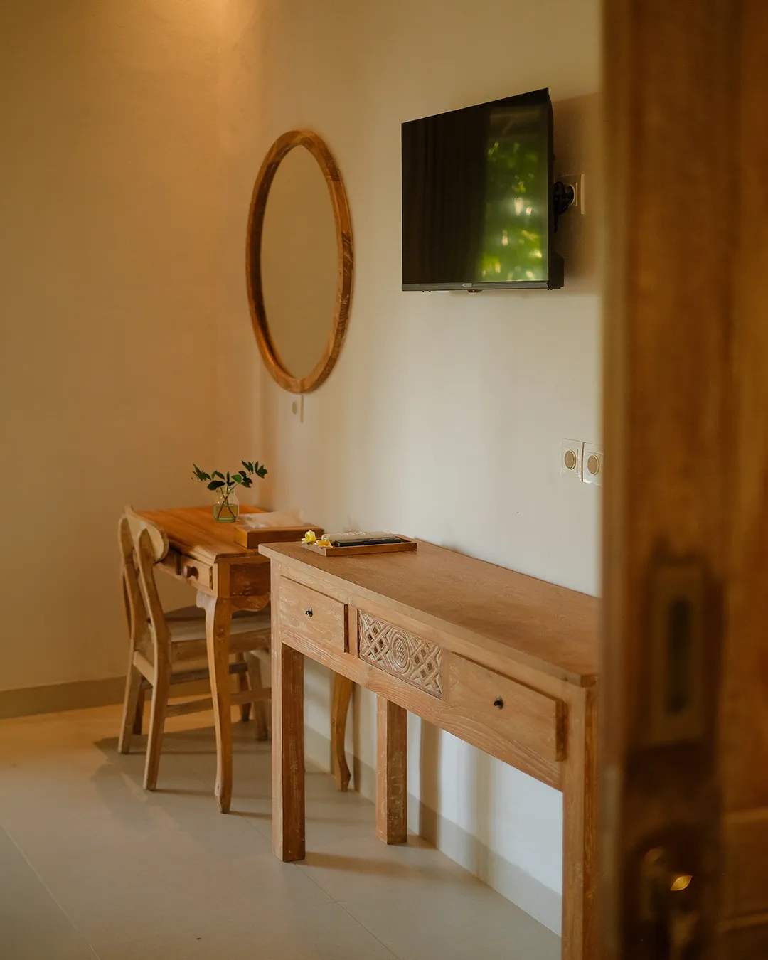 Spacious bedroom with floor-to-ceiling windows in Bali villa