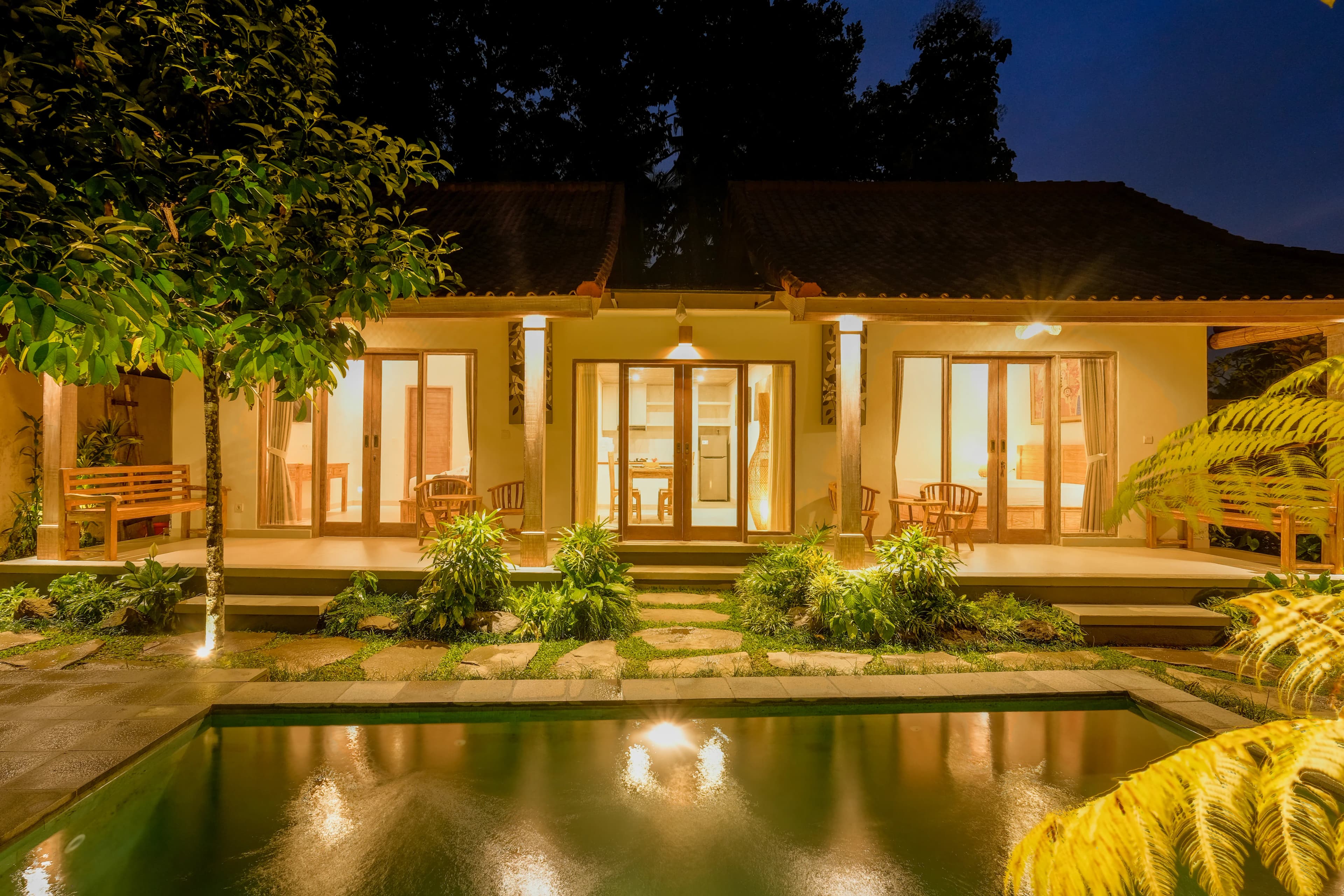 Entrance pathway with rice field view at private villa in Ubud