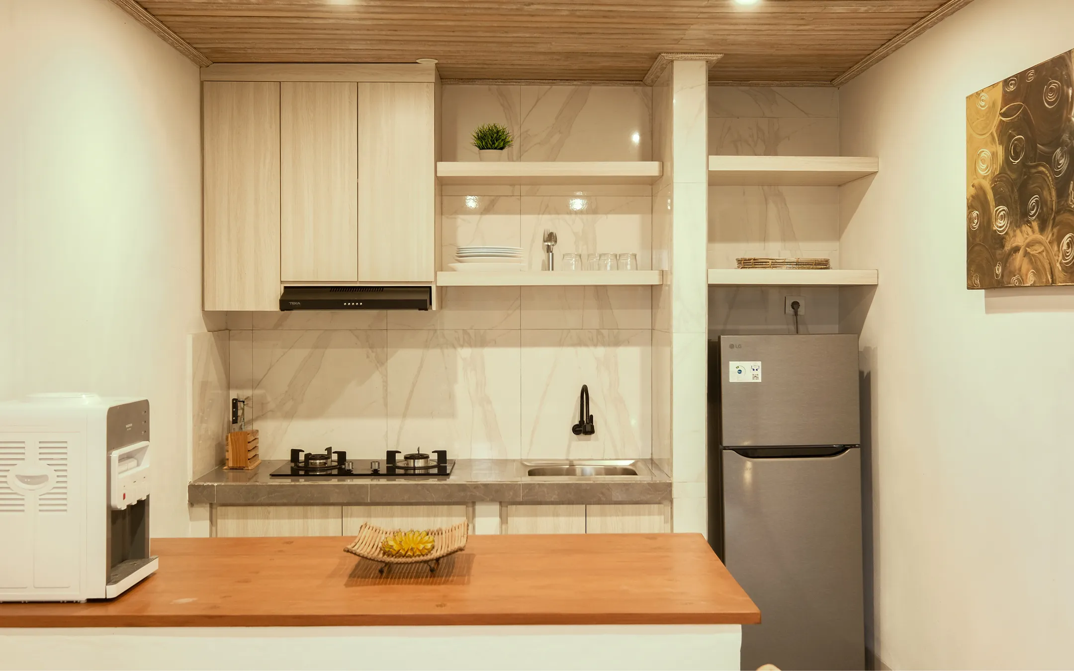 Open kitchen with rice field view in private Bali villa