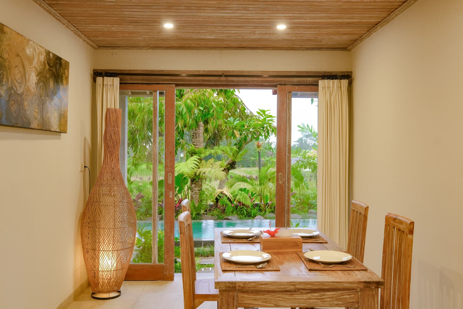 Minimalist kitchen design with wooden accents in Bali villa