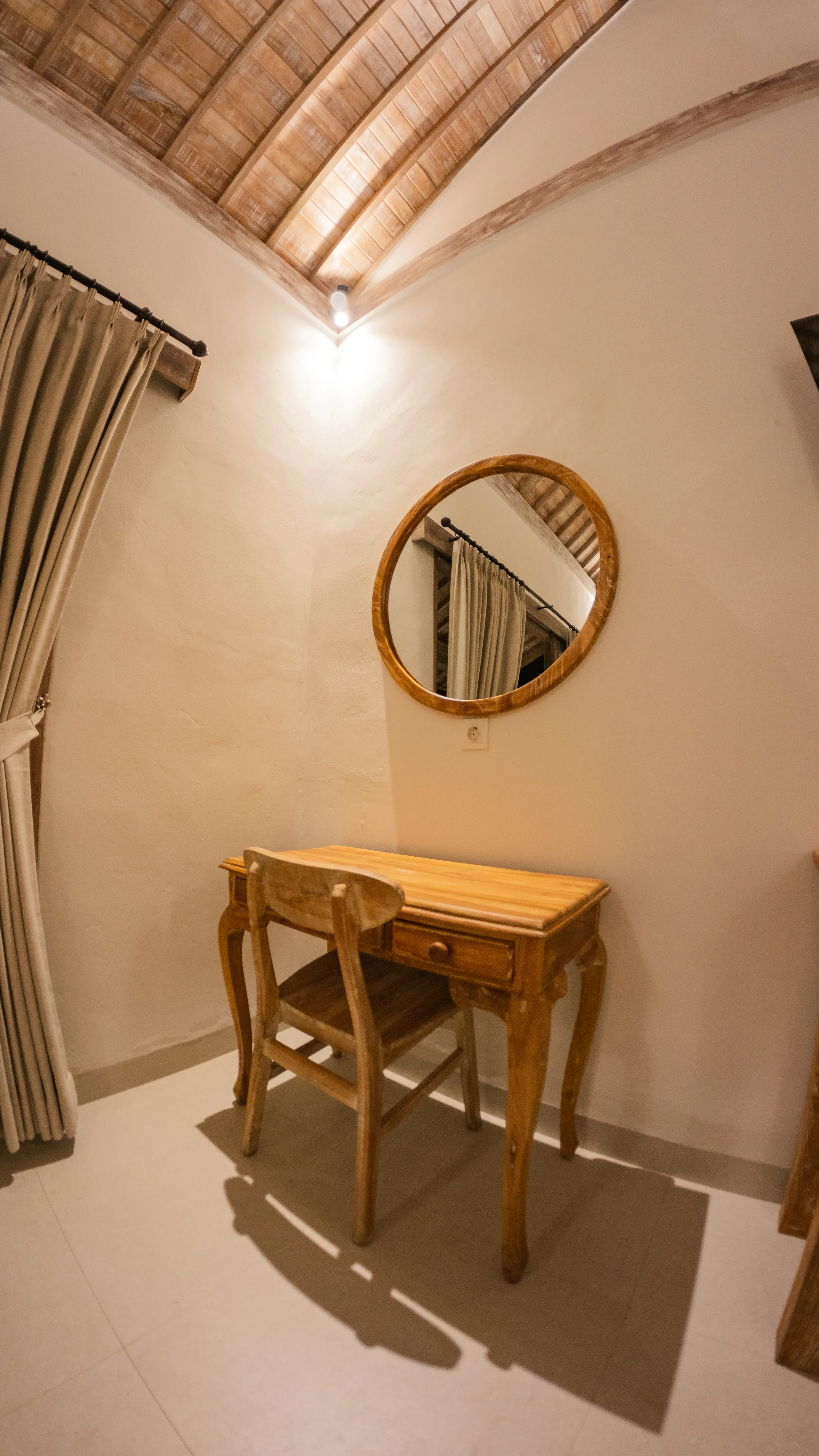 Warm-toned bedroom with balcony view